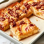 Keto Peach Pecan Cake Bars A single keto peach pecan cake bar showing a tender cake base topped with soft peaches and toasted pecans