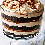 Make-Ahead Salted Caramel Brownie Trifle Salted caramel brownie trifle with layers of cheesecake mousse and crushed pretzels